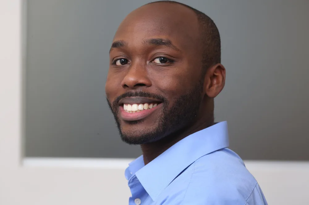 Compass member Adam Farrah